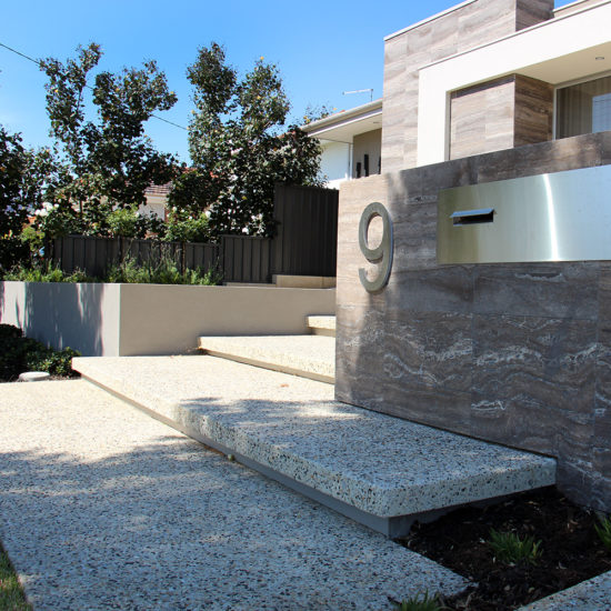 Retaining garden walls with feature letterbox